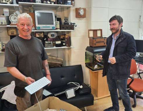 Business IT technician repairing desktop in Oxford office